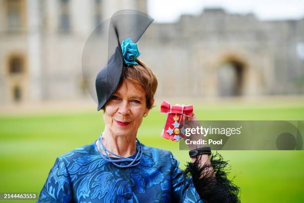 Celia Imrie poses after being made a Commander of the Order of the British Empire during an investiture ceremony at Windsor Castle on April 9, 2024...