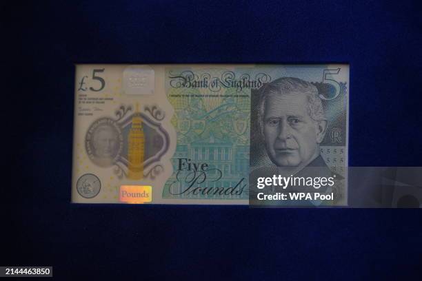 Bank note bearing a portrait of King Charles III, which will enter circulation on June 5, presented to the King by the Bank of England Governor...