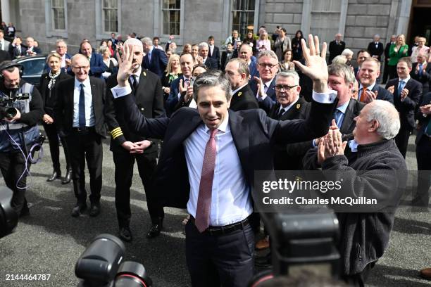 Simon Harris is greeted by Fine Gael TD’s after being appointed Taoiseach outside Leinster House on April 9, 2024 in Dublin, Ireland. At 37, Simon...