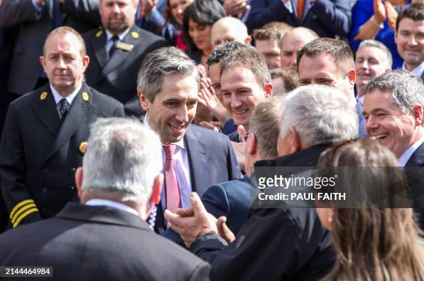 Fine Gael leader and Ireland's incoming Prime Minster Simon Harris is greeted by colleagues and family members as he leaves the Dail, the lower house...