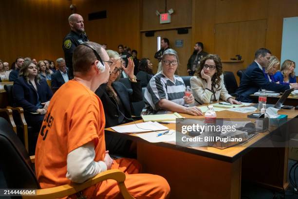 James Crumbley, his attorney Mariell Lehman, Jennifer Crumbley, and her attorney Shannon Smith, sit in court for sentencing on four counts of...