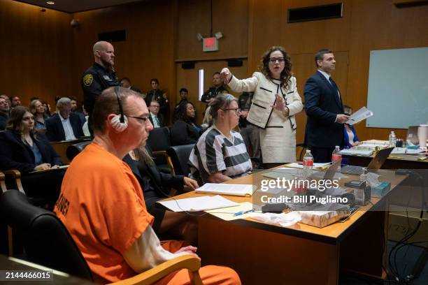 James Crumbley, his attorney Mariell Lehman, Jennifer Crumbley, and her attorney Shannon Smith, sit in court for sentencing on four counts of...