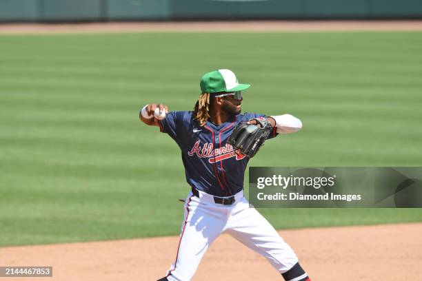 Ambioris Tavarez of the Atlanta Braves warms up during the ninth inning of a spring training game against the Boston Red Sox at CoolToday Park on...