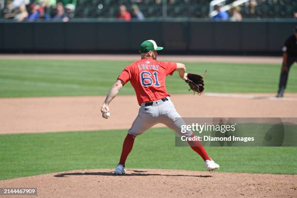 Lucas Luetge of the Boston Red Sox throws a pitch during the eighth inning of a spring training game against the Atlanta Braves at CoolToday Park on...