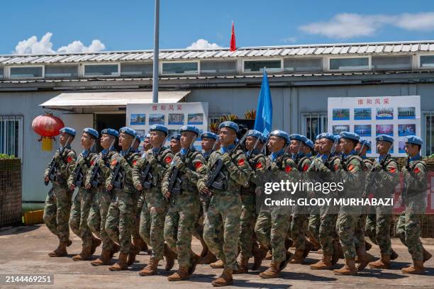 Chinese peacekeepers parade through the MONUSCO base on the occasion of their farewell in Bukavu, eastern Democratic Republic of Congo on April 09,...