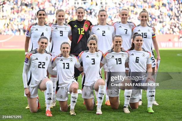 Germany's defender Bibiane Schulze, Germany's defender Sjoeke Nusken, Germany's goalkeeper Ann-Katrin Berger, Germany's defender Sarai Linder,...
