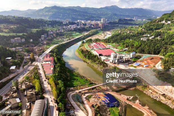 Overlooking the construction site of Qingyukou Reservoir, a major national water conservancy project, in Tongjiang County, Bazhong City, Sichuan...