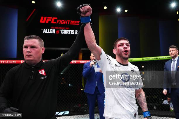 Chepe Mariscal reacts after his split-decision victory against Morgan Charriere of France in a featherweight fight during the UFC Fight Night event...