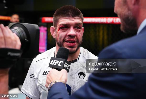 Chepe Mariscal reacts after his split-decision victory against Morgan Charriere of France in a featherweight fight during the UFC Fight Night event...