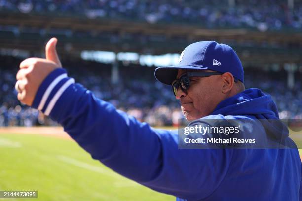 Manager Dave Roberts of the Los Angeles Dodgers waves to fans prior to the game against the Chicago Cubs at Wrigley Field on April 06, 2024 in...