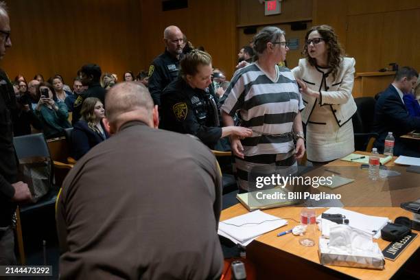 Jennifer Crumbley, the mother of Oxford High School mass shooter Ethan Crumbley, is removed from the courtroom following her sentence of ten to...