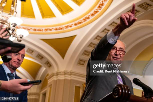 Senate Majority Leader Chuck Schumer takes questions from reporters during a news conference following a Senate Democratic party policy luncheon at...