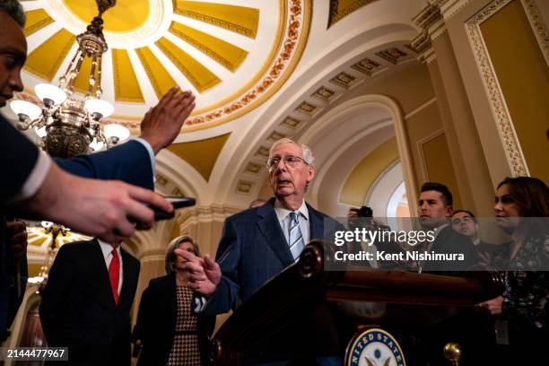 Senate Minority Leader Mitch McConnell takes questions from reporters during a news conference following a Senate Republican party policy luncheon at...