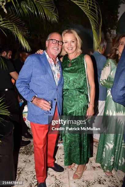 Basil Mavrolian and Kim Charlton attend Kim & Greg Dryer host Cocktails & Musica Cubana at Private Residence on April 6, 2024 in Palm Beach, Florida.