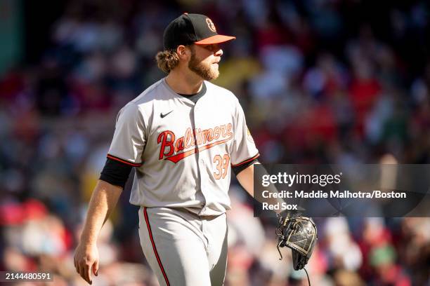 Corbin Burnes of the Baltimore Orioles walks off the mound during the 2024 Opening Day game against the Boston Red Sox on April 9, 2024 at Fenway...