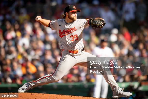 Corbin Burnes of the Baltimore Orioles pitches during the 2024 Opening Day game against the Boston Red Sox on April 9, 2024 at Fenway Park in Boston,...