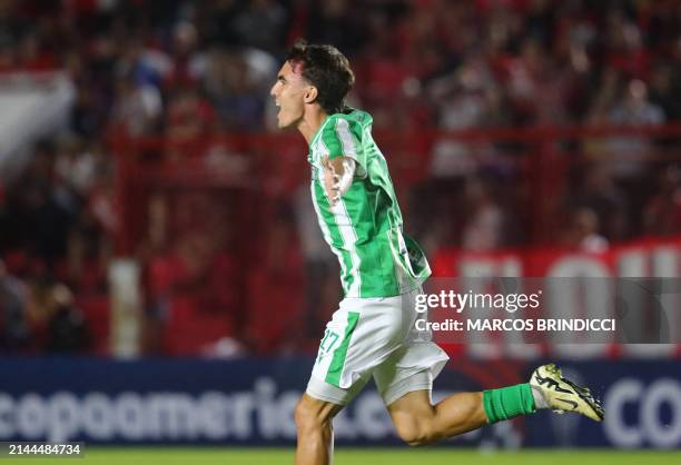 Racing's forward Tomas Veron celebrates after scoring during the Copa Sudamericana group stage first leg match between Argentina's Argentinos Juniors...