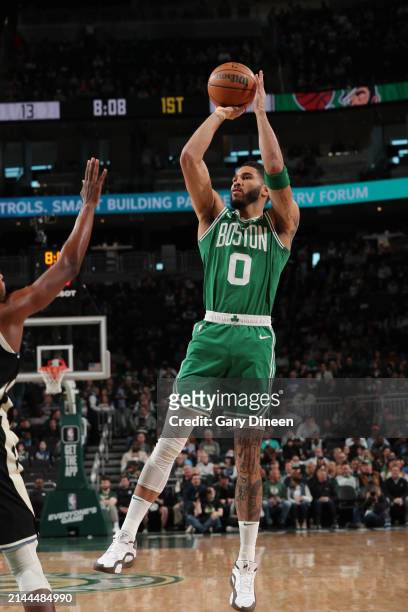 Jayson Tatum of the Boston Celtics shoots the ball during the game against the Milwaukee Bucks on April 9, 2024 at the Fiserv Forum Center in...