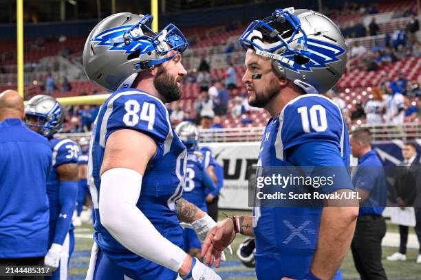 Jake Sutherland of the St. Louis Battlehawks and AJ Mccarron of the St. Louis Battlehawks speak before a game against the Arlington Renegades at The...