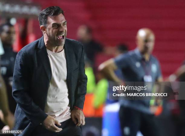 Argentinos Juniors' coach Pablo Guede gestures during the Copa Sudamericana group stage first leg match between Argentina's Argentinos Juniors and...