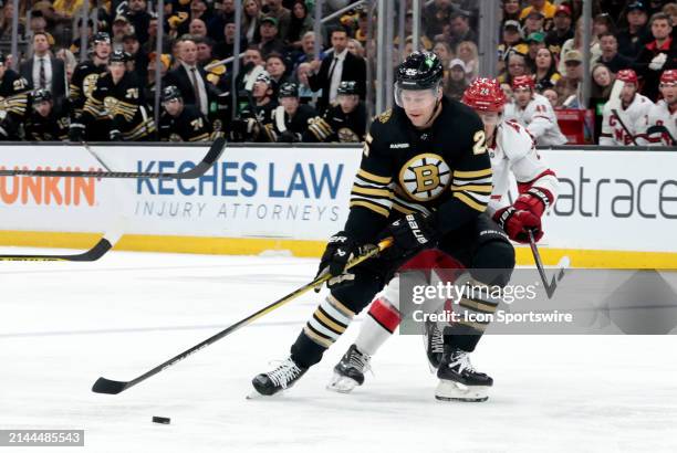 Boston Bruins right defenseman Brandon Carlo gets position on the puck during a game between the Boston Bruins and the Carolina Hurricanes on April 9...