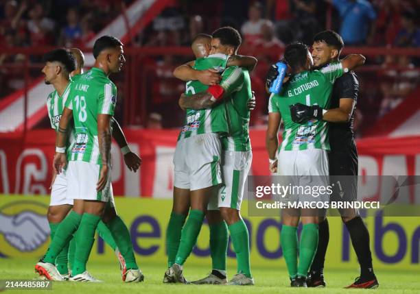 Racing players react at the end of the Copa Sudamericana group stage first leg match between Argentina's Argentinos Juniors and Uruguay's Racing at...
