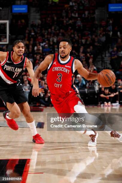 McCollum of the New Orleans Pelicans drives to the basket during the game against the Portland Trail Blazers on April 9, 2024 at the Moda Center...