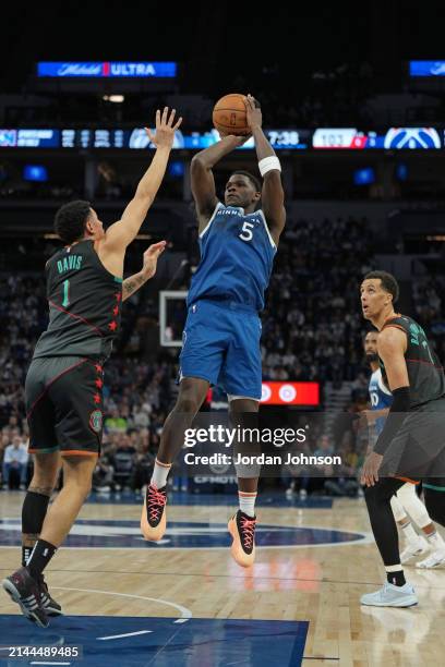 Anthony Edwards of the Minnesota Timberwolves shoots the ball during the game against the Washington Wizards on April 9, 2024 at Target Center in...