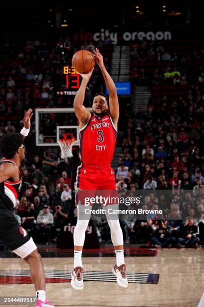 McCollum of the New Orleans Pelicans shoots the ball during the game against the Portland Trail Blazers on April 9, 2024 at the Moda Center Arena in...