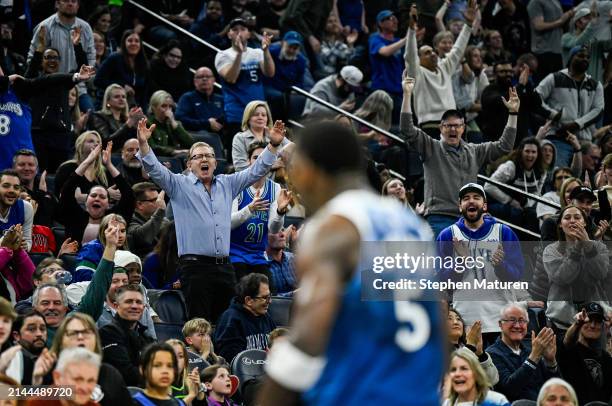 Fans cheer in the stands after a play by Anthony Edwards of the Minnesota Timberwolves in the third quarter of the game against the Washington...