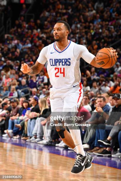 Norman Powell of the LA Clippers handles the ball during the game on April 9, 2024 at Footprint Center in Phoenix, Arizona. NOTE TO USER: User...