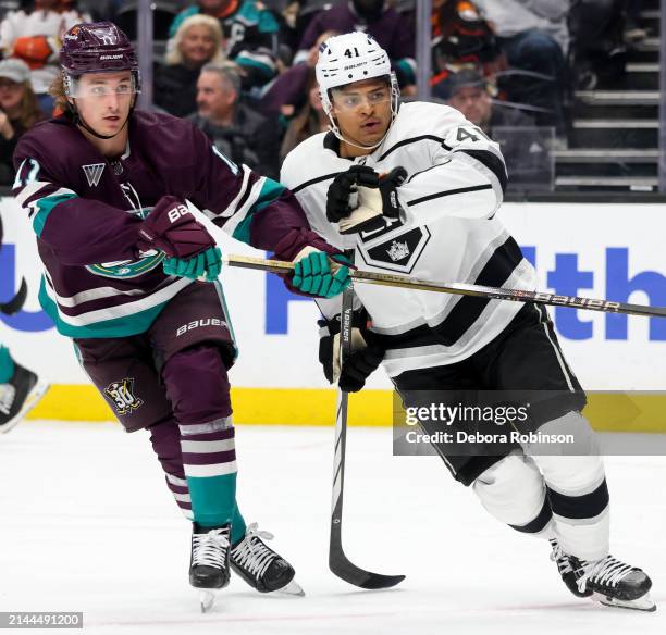 Alex Killorn of the Anaheim Ducks and Carl Grundstrom of the Los Angeles Kings battle for position during the second period at Honda Center on April...