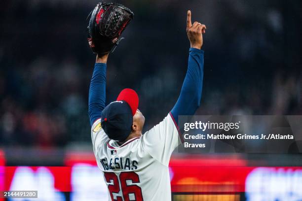 Raisel Iglesias of the Atlanta Braves celebrates after winning the game against the New York Mets at Truist Park on April 9, 2024 in Atlanta, Georgia.