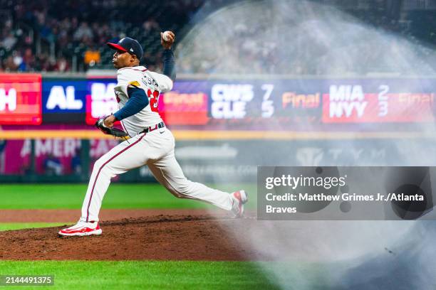 Raisel Iglesias of the Atlanta Braves pitches in the ninth inning against the New York Mets at Truist Park on April 9, 2024 in Atlanta, Georgia.
