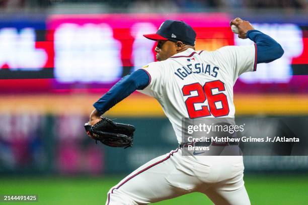 Raisel Iglesias of the Atlanta Braves pitches in the ninth inning against the New York Mets at Truist Park on April 9, 2024 in Atlanta, Georgia.