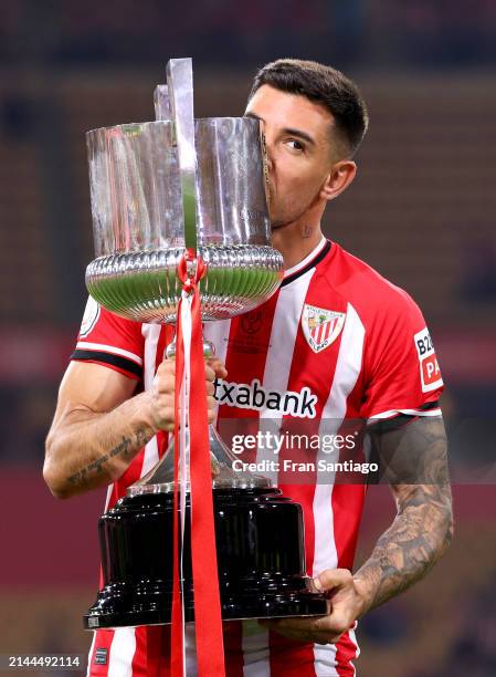 Yuri Berchiche of Athletic Club kisses the Copa Del Rey trophy following victory in the Copa Del Rey Final between Athletic Club and Real Mallorca at...