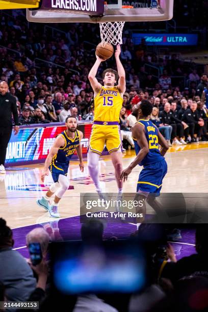 Austin Reaves of the Los Angeles Lakers drives to the basket during the game against the Golden State Warriors on April 9, 2024 at Crypto.Com Arena...