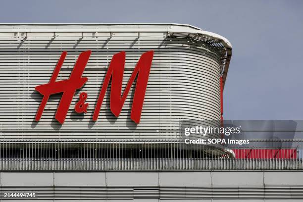 The logo of H&M is seen on the building in the center of Warsaw.