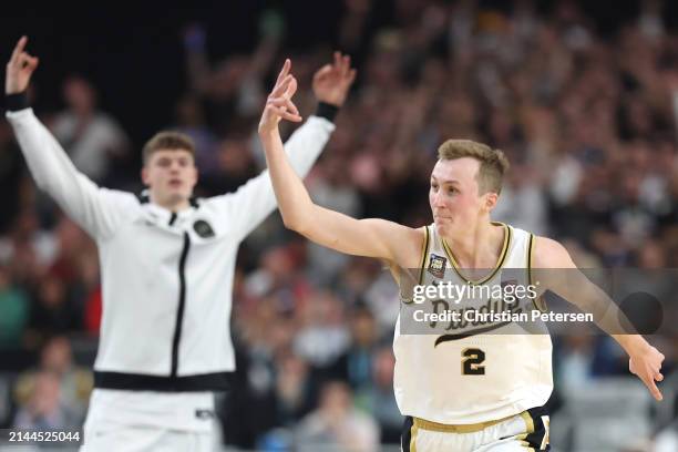 Fletcher Loyer of the Purdue Boilermakers celebrates after making a shot in the second half against the North Carolina State Wolfpack in the NCAA...