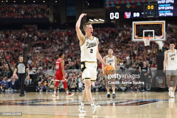 Fletcher Loyer of the Purdue Boilermakers celebrates after beating the North Carolina State Wolfpack 63-50 in the NCAA Men's Basketball Tournament...