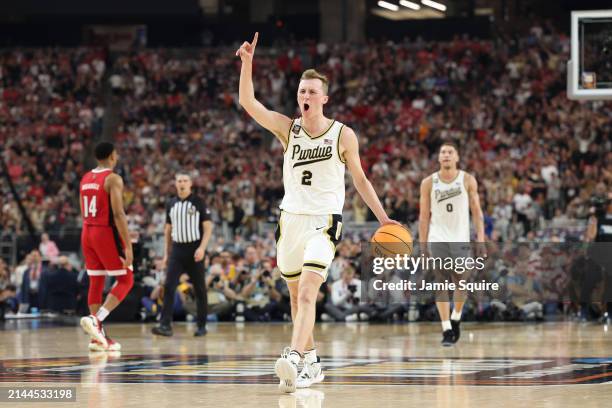 Fletcher Loyer of the Purdue Boilermakers celebrates after beating the North Carolina State Wolfpack 63-50 in the NCAA Men's Basketball Tournament...