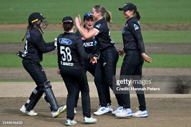 Jess Kerr of New Zealand celebrates the wicket of Sophia Dunkley of England during game three of the Women's ODI series between New Zealand and...