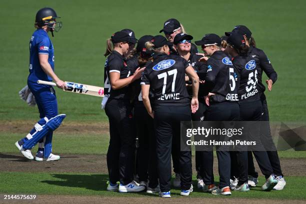 Amelia Kerr of New Zealand celebrates after the run out of Heather Knight of England during game three of the Women's ODI series between New Zealand...