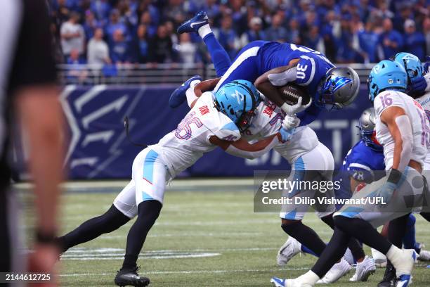 Wayne Gallman II of the St. Louis Battlehawks runs the ball in the first half during a game against the Arlington Renegades at The Dome at America’s...