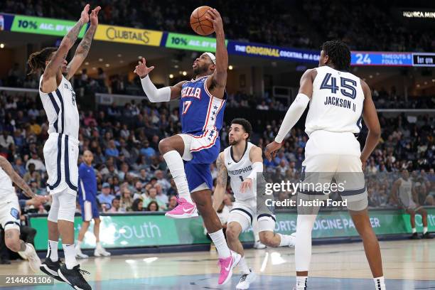 Buddy Hield of the Philadelphia 76ers goes to the basket against Brandon Clarke of the Memphis Grizzlies during the first half at FedExForum on April...