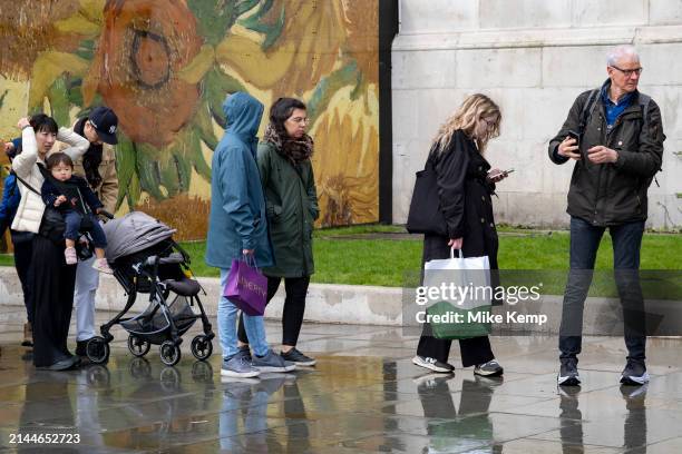 National Gallery celebrates its 200th year a hoarding featuring details from many well known paintings by famous artists including one of the...