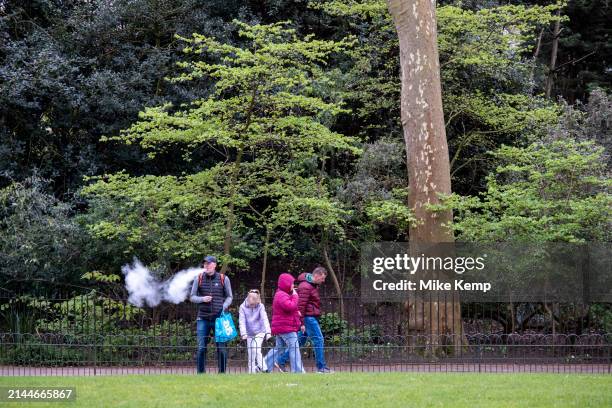 Man vaping clouds of smoke in St James's Park on 9th April 2024 in London, United Kingdom. Vaping is often seen as a safe or safer alternative to...