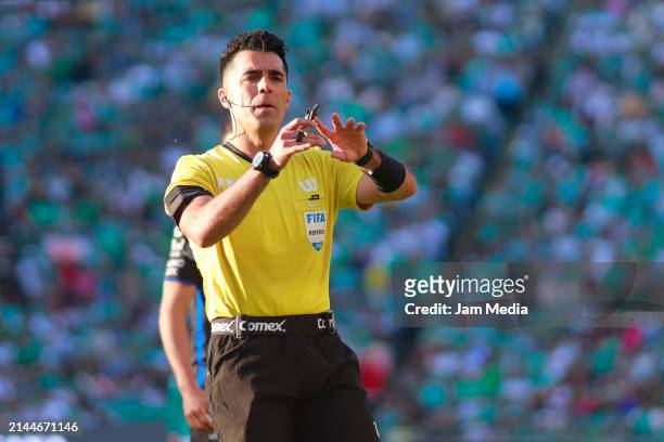 Adonai Escobedo, central referee, gestures during the 14th round match between Leon and Queretaro as part of the Torneo Clausura 2024 Liga MX at Leon...