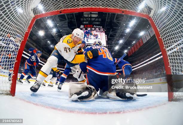 Semyon Varlamov of the New York Islanders defends the net against the Nashville Predators at UBS Arena on April 06, 2024 in Elmont, New York. The...