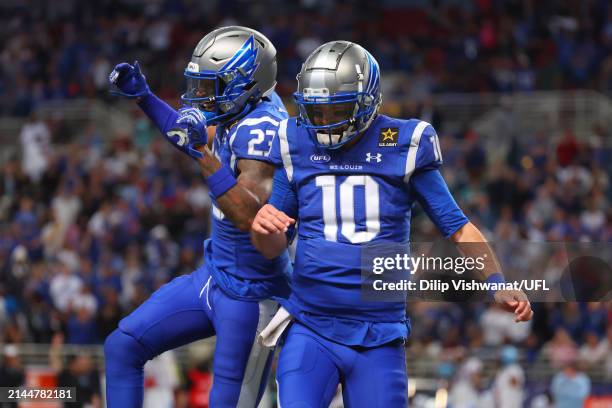 Kameron Kelly and AJ Mccarron of the St. Louis Battlehawks celebrate in the second half during a game against the Arlington Renegades at The Dome at...